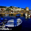 PANORAMICA DEL PORTO DI TORRE VADO CON SULLO SFONDO LA TORRE. TORRE VADO E' UNA TRANQUILLA E SPLENDIDA LOCALITA' MARINA SITUATA NEL SUD SALENTO A CIRCA 70 KM DA LECCE,DA DOVE E' POSSIBILE RAGGIUNGERLA CON LA S.S. LECCE GALLIPOLI E GALLIPOLI S.MARIA DI LEUCA IN CIRCA 45 MINUTI.SOPRATUTTO D'ESTATE QUESTA RIDENTE MARINA OFFRE INNUMEREVOLI POSSIBILITA' DI SVAGO SIA PER I GIOVANI SIA AI MENO GIOVANI, CON CONCERTI DI VARIO STILE MUSICALE,MOSTRE DI PITTURA E VARI APPUNTAMENTI CULTURALI.VICINO AL MARE C'E' SEMPRE UN PARCO DIVERTIMENTI CON GIOSTRE ED ATTRAZIONI VARIE PER I PIU' PICCOLI E NUMEROSI GAZEBO DOVE COMPRARE TUTTO CIO' CHE CONCERNE LA TRADIZIONE SALENTINA.FOTOGRAFIA REALIZZATA NEL SETTEMBRE 2011 CON SMARTPHONE NOKIA 